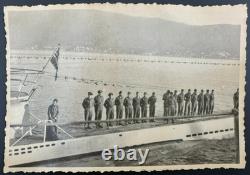 The crew lined up on deck Submarines enter port Gun German Kriegsmarine U-622